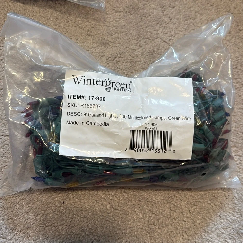 NEW in BAG Wintergreen Lighting  9' Garland, 300 Multicolored Lights- Green Wire